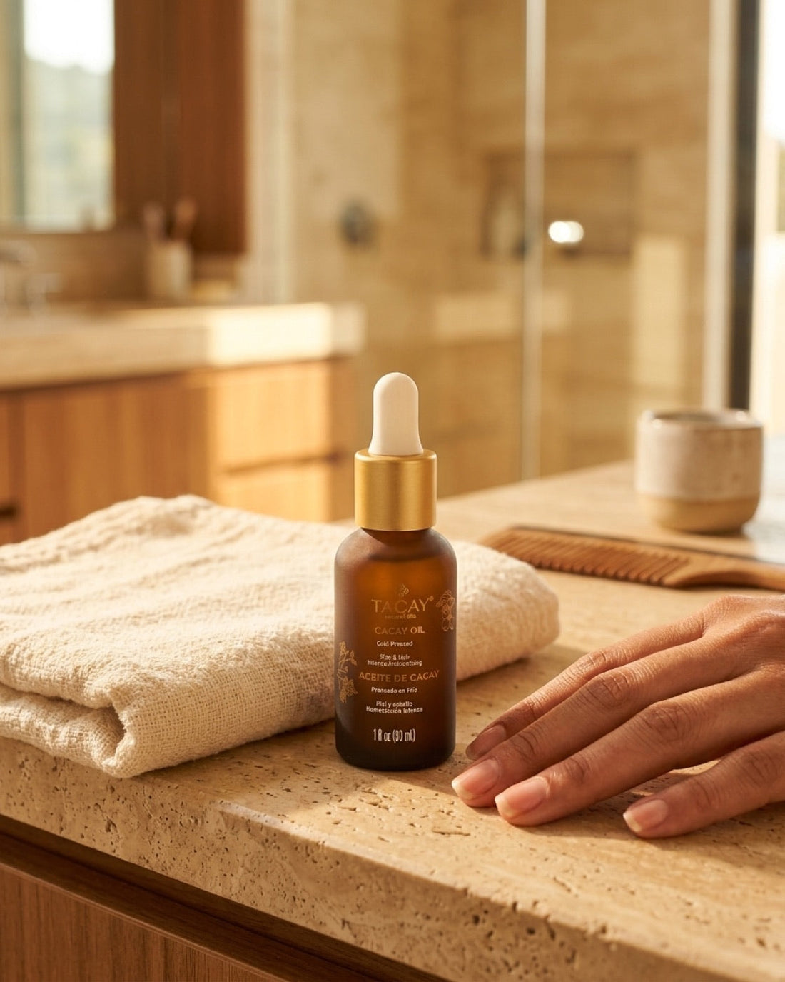 Tacay Cacay Oil on a bathroom counter, compared with rosehip and argan oil